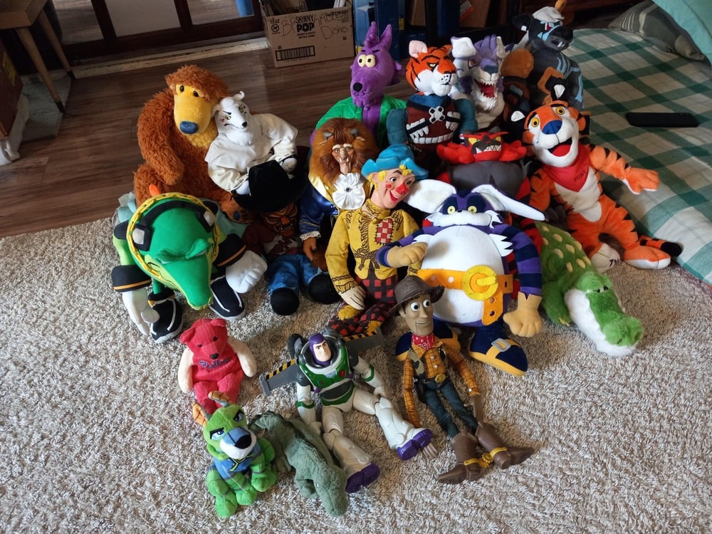 A group of toys and stuffed animals.