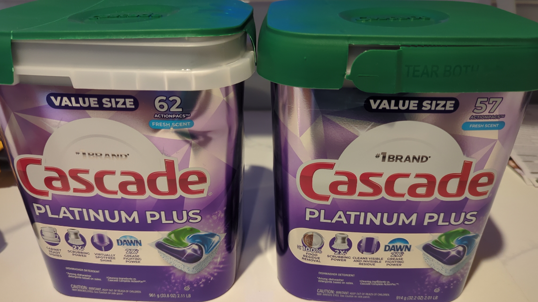 Two Cascade Platinum Plus dishwasher pod containers with 62 and 57 pods.