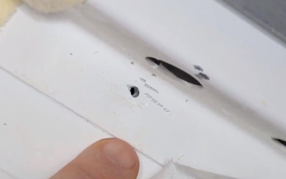 A small puncture in a spacecraft surface is examined.
