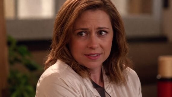 A woman with shoulder-length brown hair looks toward the side with a concerned and slightly skeptical expression.