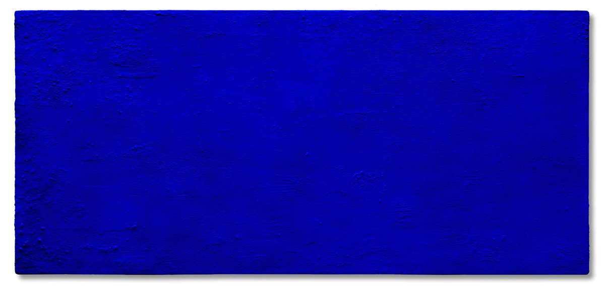 A rectangular canvas painted entirely in a deep, vivid blue hue, with a textured surface visible across the artwork.