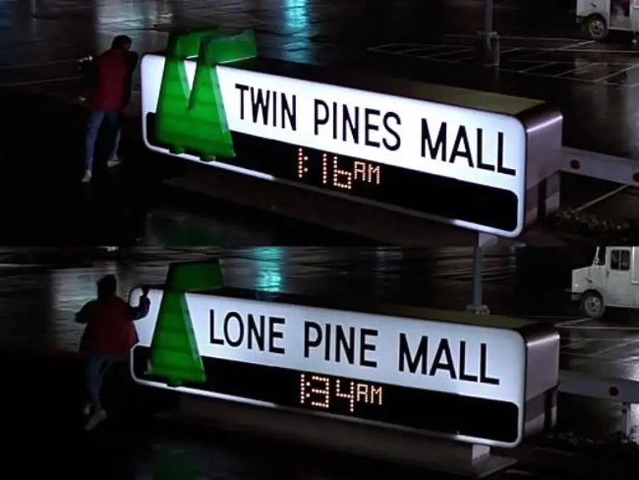 Two images show a mall sign at night. First, it reads “Twin Pines Mall” at 1:16 AM. Second, it reads “Lone Pine Mall” at 1:34 AM. The same person stands near the sign in both images.