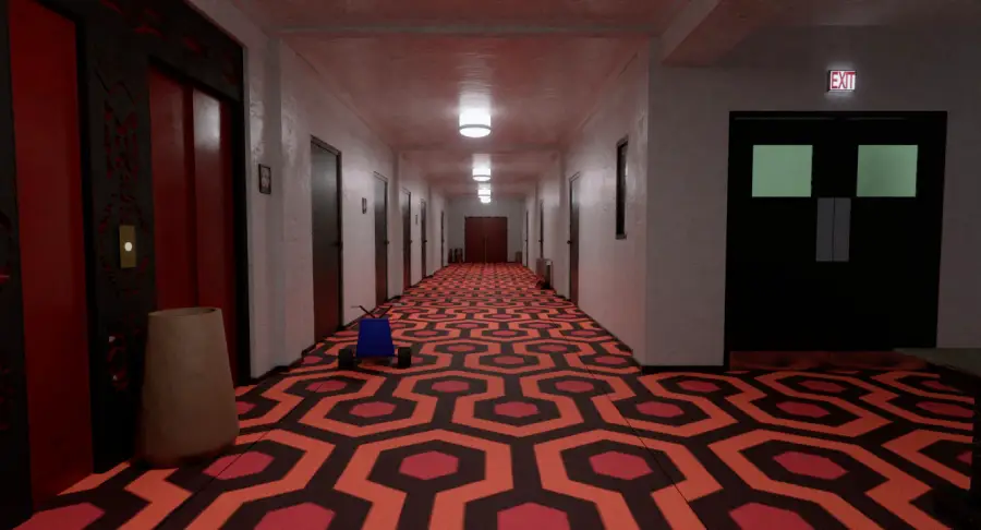 A long hallway with a distinct red and orange hexagonal carpet pattern, dim lighting, closed doors along the walls, and a blue tricycle near an elevator; inspired by the Overlook Hotel in “The Shining.”