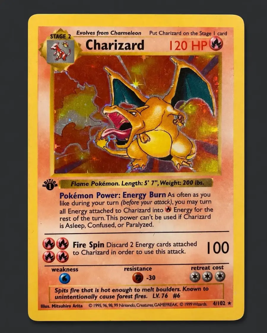 A Charizard Pokémon card featuring Charizard with wings spread and fire in its mouth. The card displays Charizard’s stats, attacks, and abilities on a yellow and orange background.
