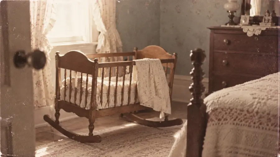 A vintage wooden cradle with a lace blanket sits by a sunny window in a cozy, old-fashioned bedroom with lace curtains and a dresser.