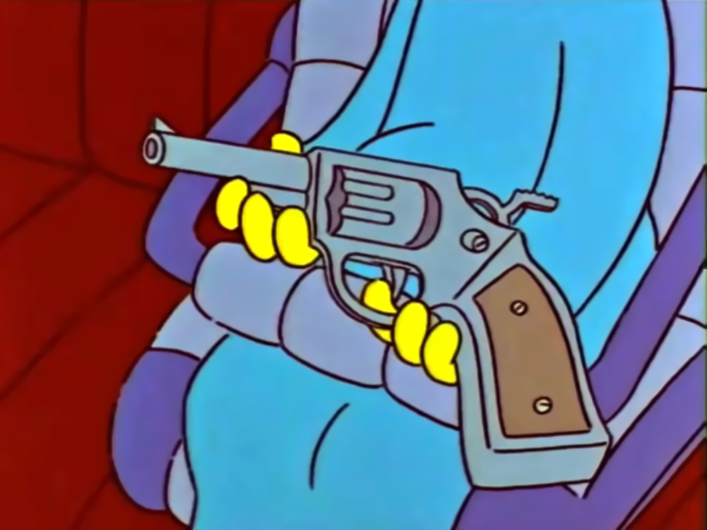 A yellow hand holding a gray revolver.
