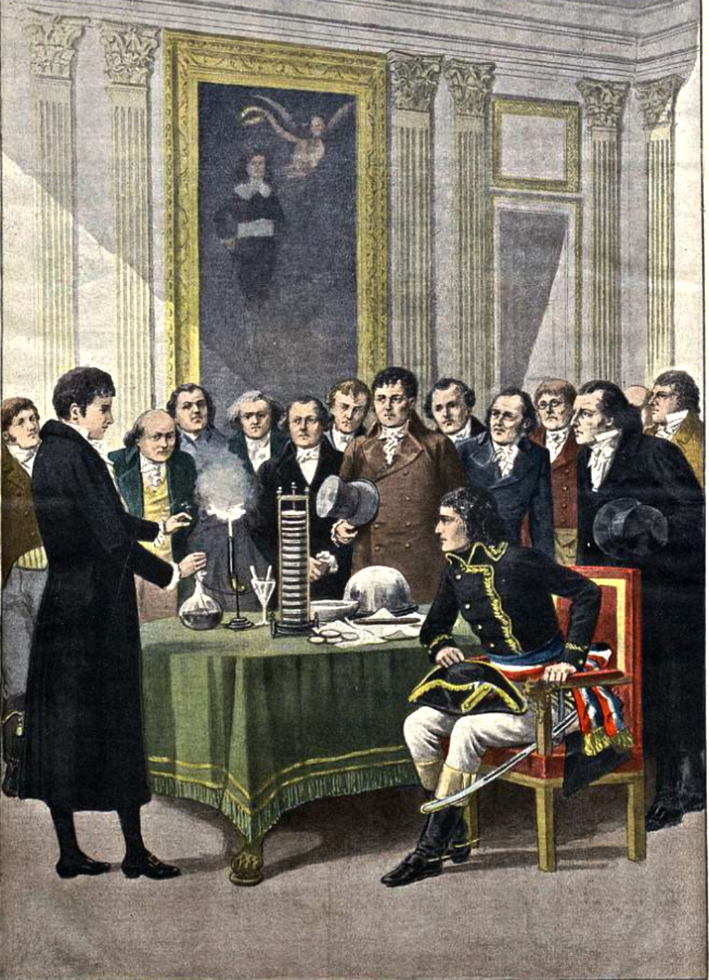 A man in a black coat demonstrates a scientific experiment to a group of men, including one in a military uniform seated at a table.