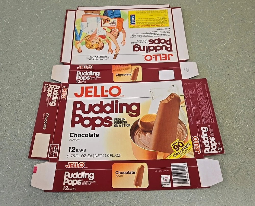 Flattened cardboard packaging for Jell-O chocolate Pudding Pops, showing the product name, an image of a chocolate pudding pop, and promotional graphics.