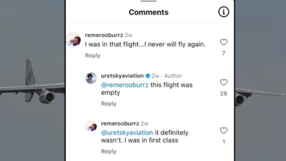 A screenshot of an Instagram comment thread where a user claims to have been on a flight and will never fly again, and the author replies that the flight was empty, leading the user to insist they were in first class.