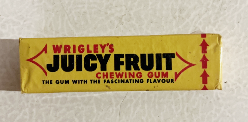 A yellow package of Wrigley’s Juicy Fruit chewing gum.