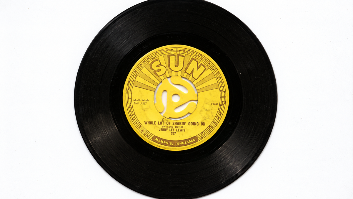A 45 rpm vinyl record of Jerry Lee Lewis’s “Whole Lot of Shakin’ Going On” on the Sun Records label.