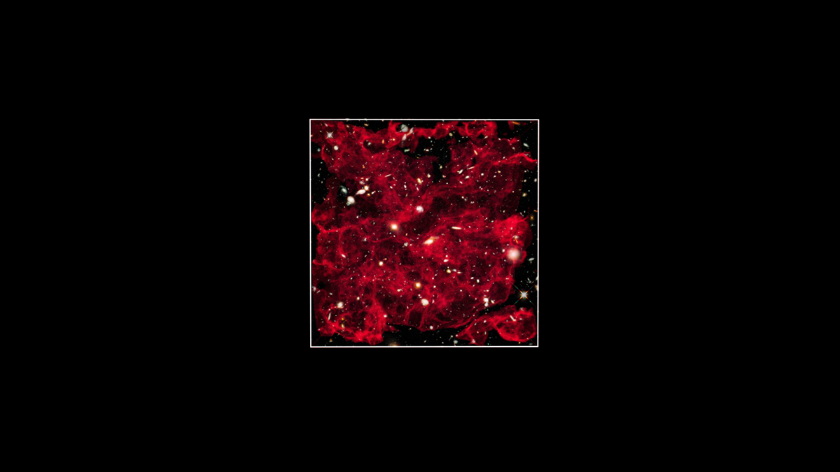 Telescope image of a glowing, red cosmic web of gas and dust containing distant galaxies.