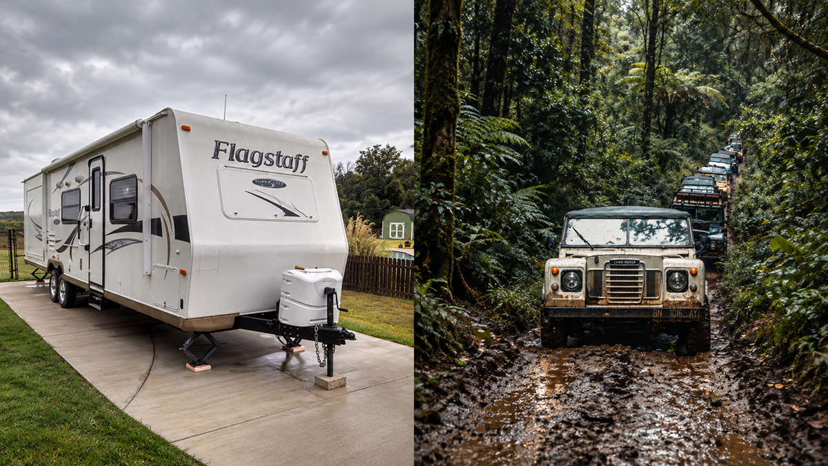 A white Flagstaff travel trailer parked on a concrete driveway next to a row of Land Rover vehicles driving through a muddy forest trail.