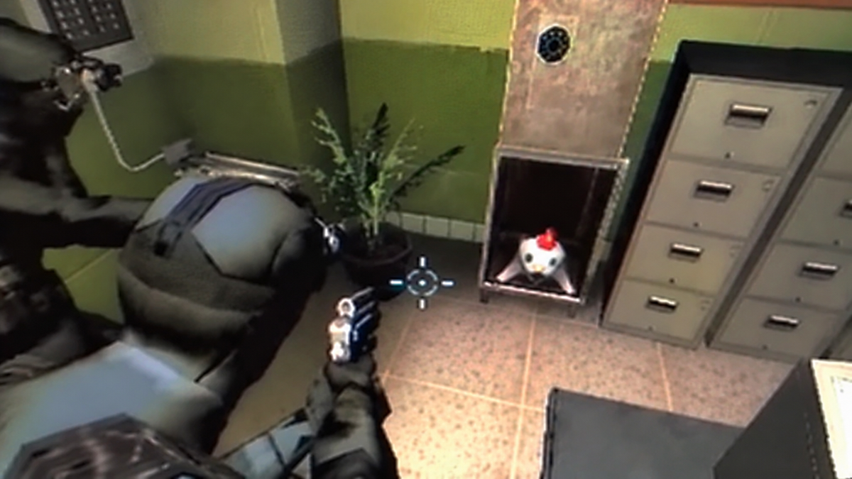 A tactical soldier aims a handgun at a small toy chicken sitting inside an open metal locker in an office.