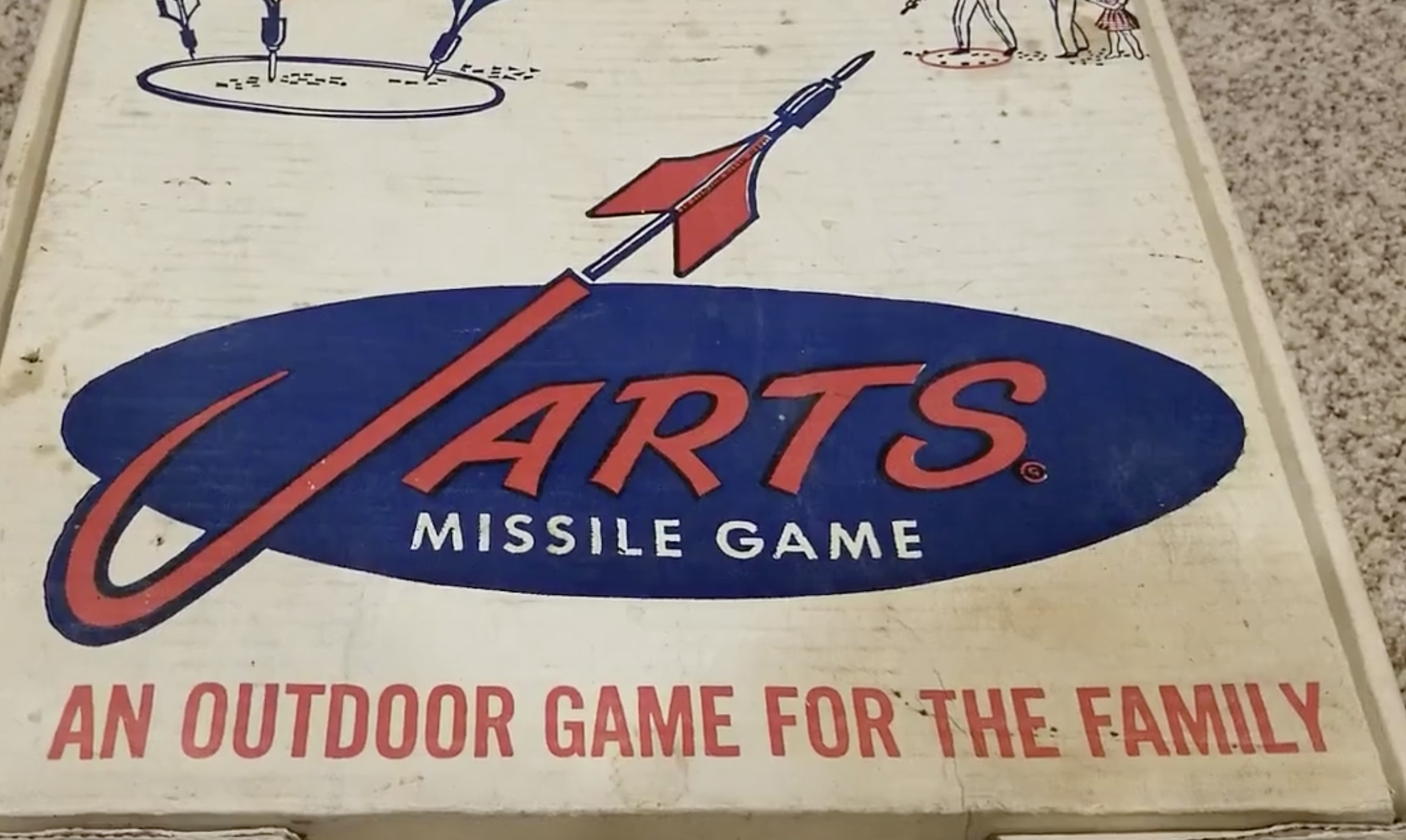 Vintage “Jarts Missile Game” box featuring a red dart graphic and the text, “An outdoor game for the family.”