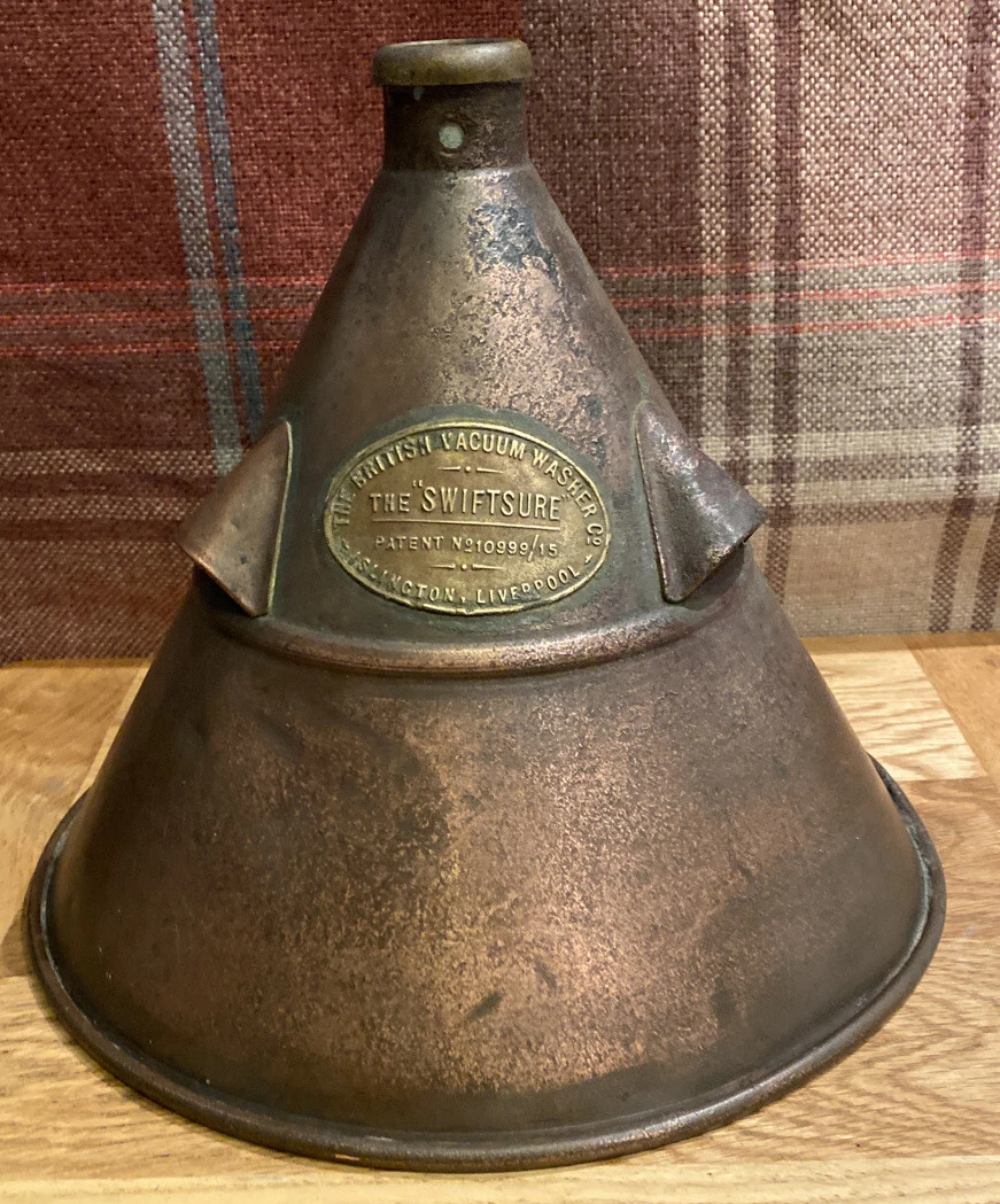 Conical copper vacuum washing device with a brass plaque reading “The British Vacuum Washer Co., The Swiftsure, Patent No. 10999/15, Islington, Liverpool.”