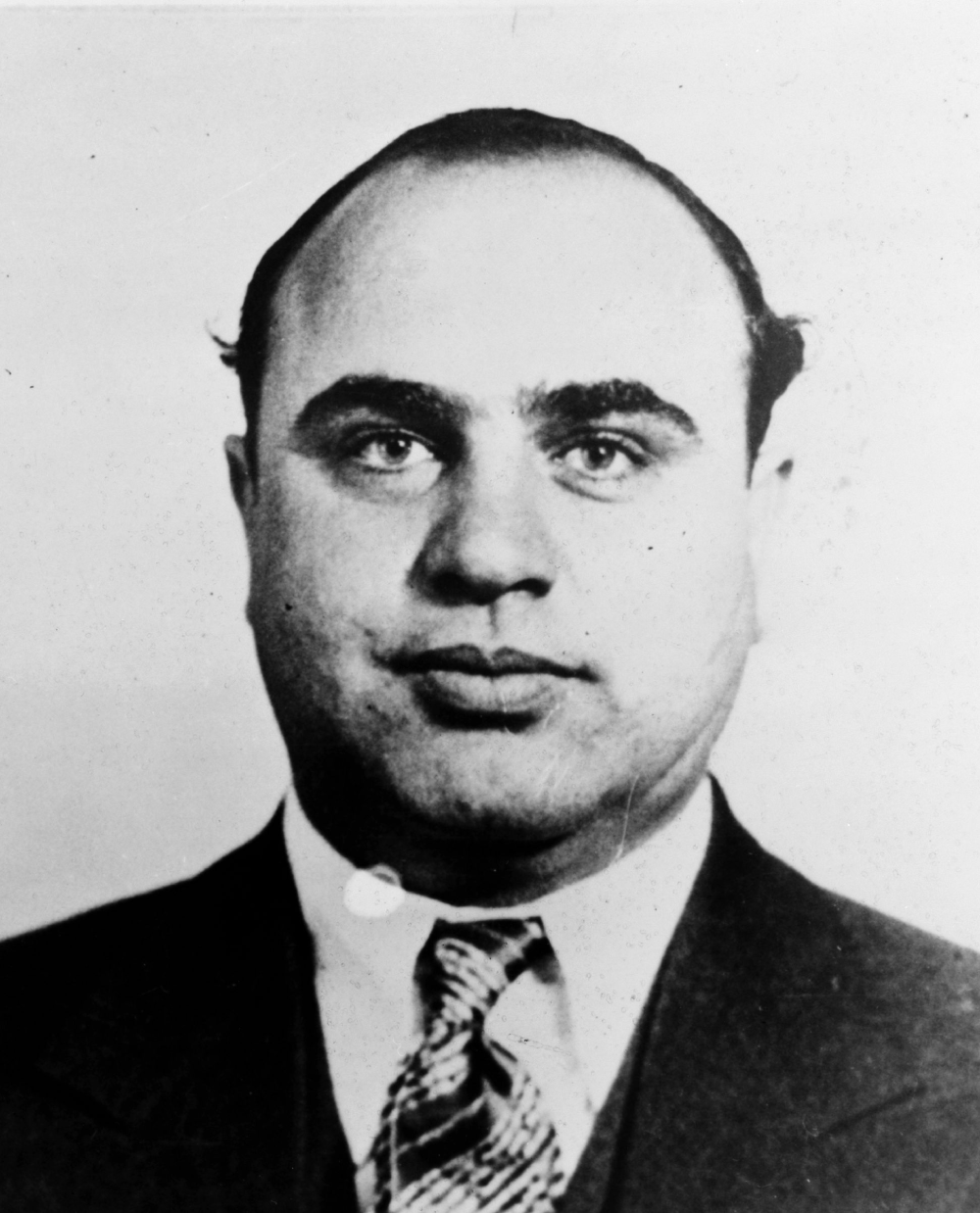 Black and white portrait of Al Capone.