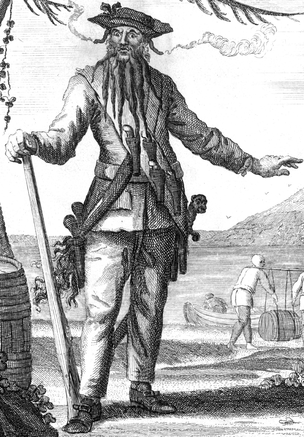 Black and white engraving of the pirate Blackbeard with a long braided beard, wearing a wide-brimmed hat and carrying pistols and a sword, standing on a shore with boats and figures in the background.