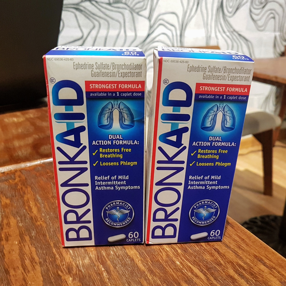 Two boxes of Bronkaid dual-action asthma symptom relief tablets, each containing 60 caplets.