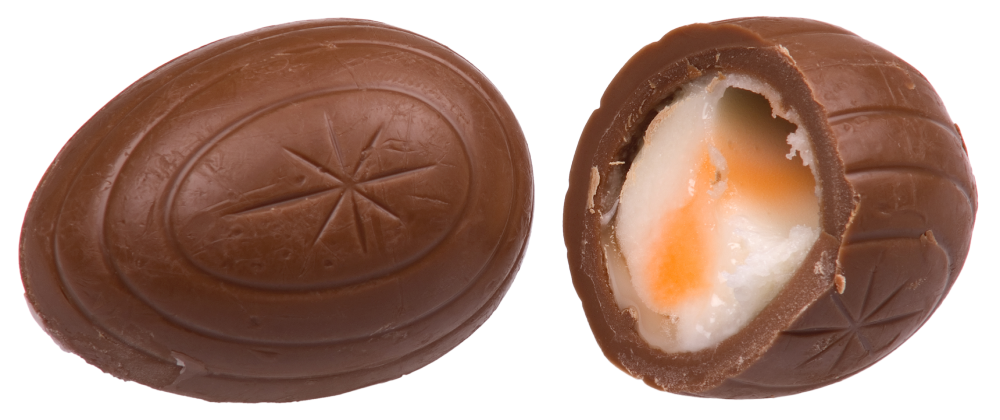 One whole milk chocolate egg and one half of a chocolate egg with a white and orange fondant filling.