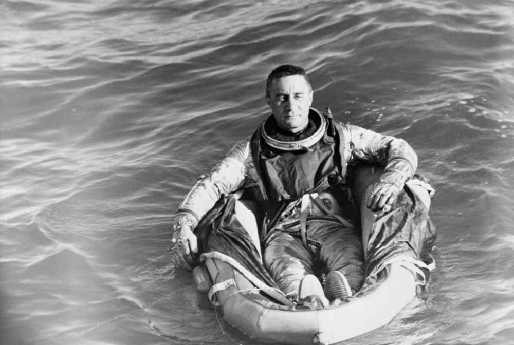 Astronaut Virgil “Gus” Grissom sits in a life raft in the ocean following his Mercury-Redstone 4 splashdown.