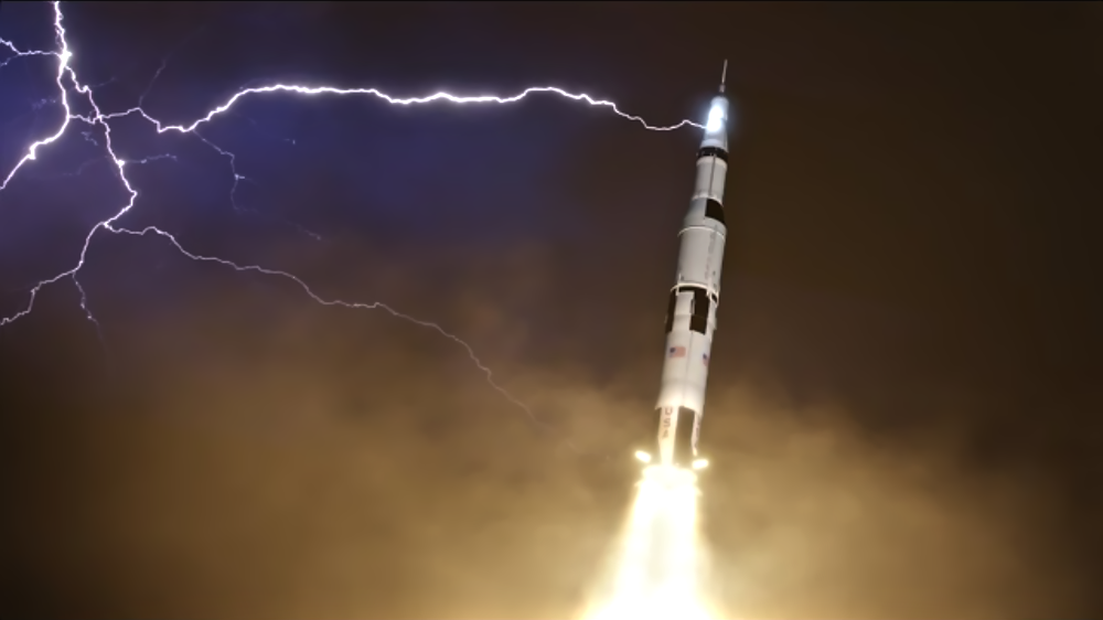 A Saturn V rocket launching into the night sky as a lightning bolt strikes near its upper stage.